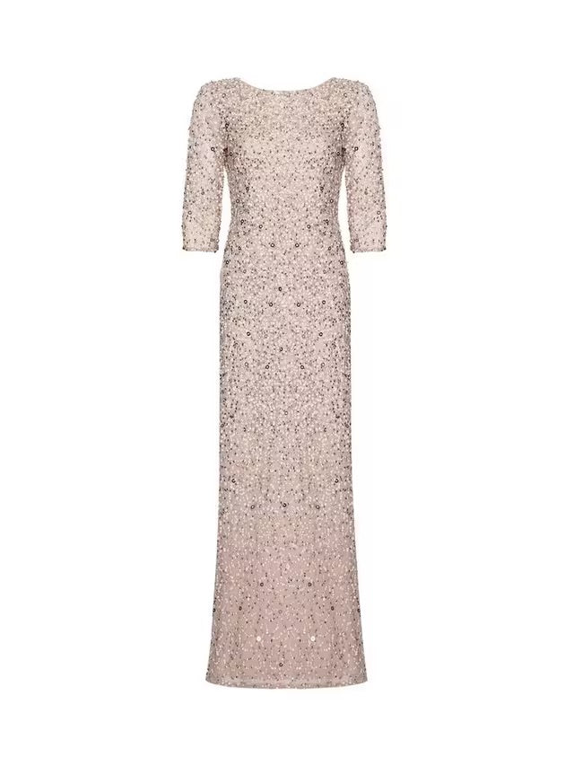 Close-up of the Adrianna Papell gown’s round neckline and densely embellished nude bodice.