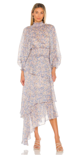 A periwinkle floral dress with a smocked waist and a back keyhole with button closure.